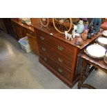 A mahogany chest fitted three long drawers