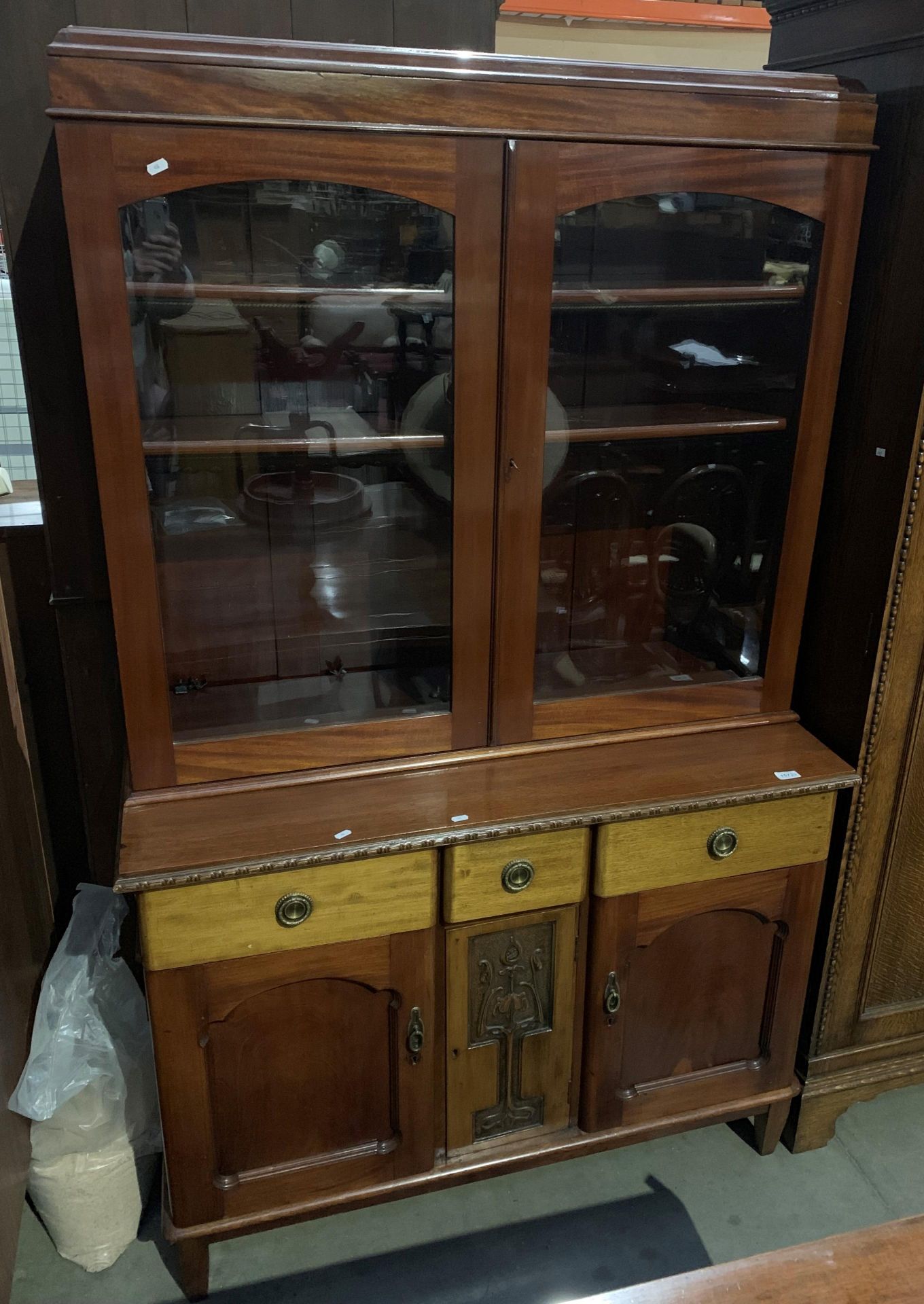 A mahogany wall unit with two glazed doors over three door base, - Image 2 of 2