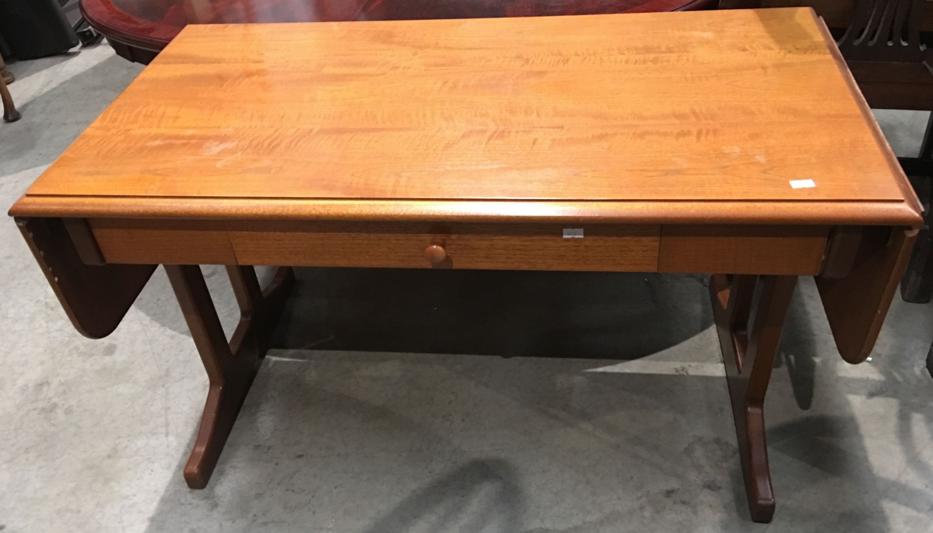Oak drop end two leaf occasional table with single drawer 53"