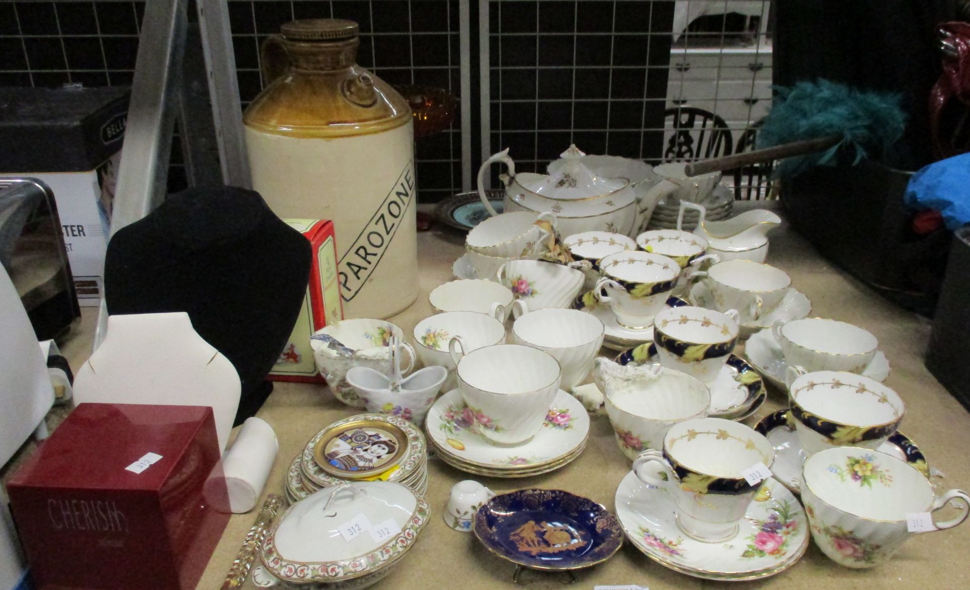 Assorted part tea services, Parozone stone jar, jewellery stands, coloured glassware,