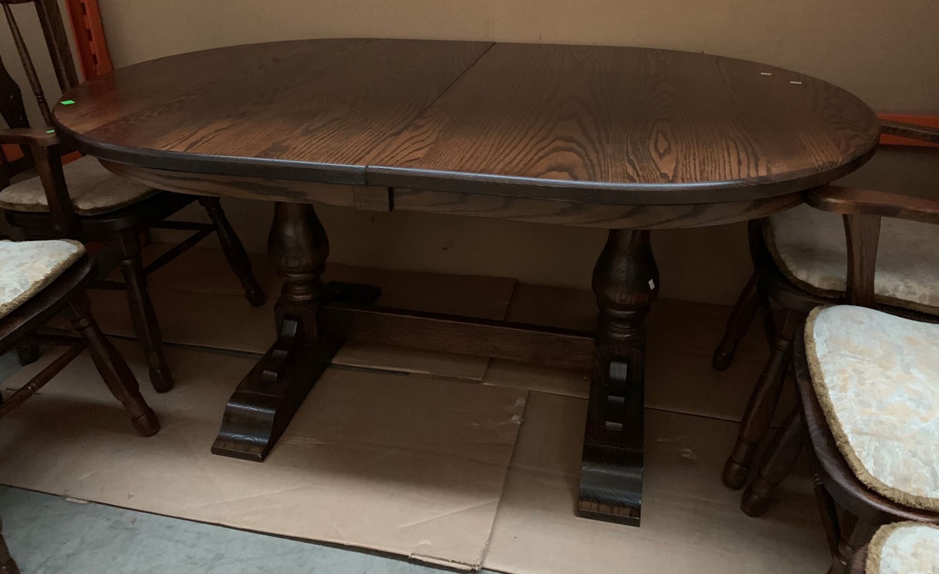 An oak dining suite comprising an oak extending dining table,