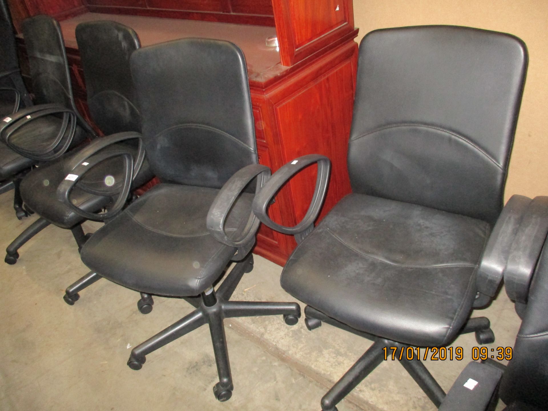2 x black leather finish operators swivel armchairs