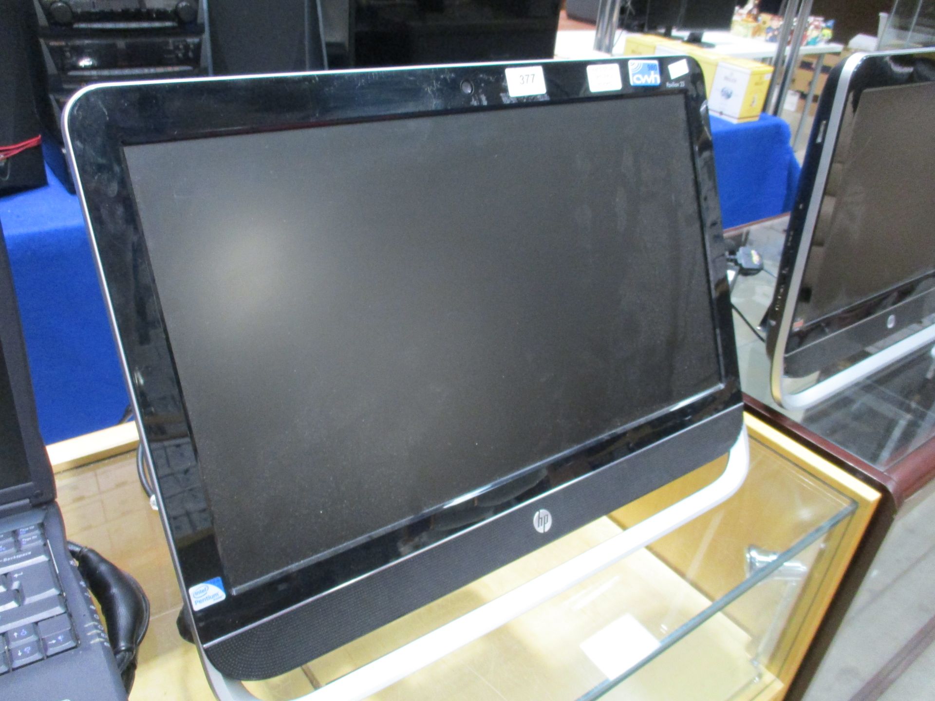 A HP Pavilion 23 all-in-one computer 23" screen Pentium complete with power adaptor