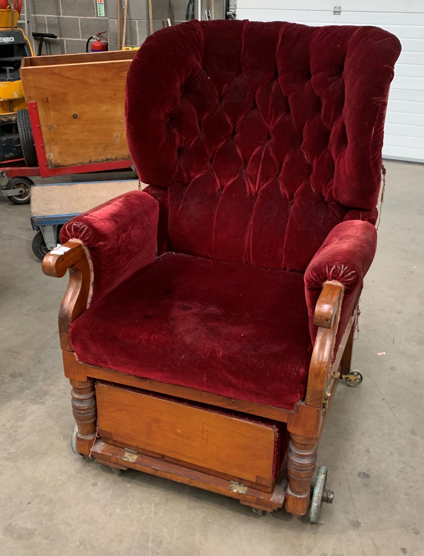 A Victorian invalid chair recovered in red velvet raised on brass wheels and labelled Leveson and - Image 2 of 6