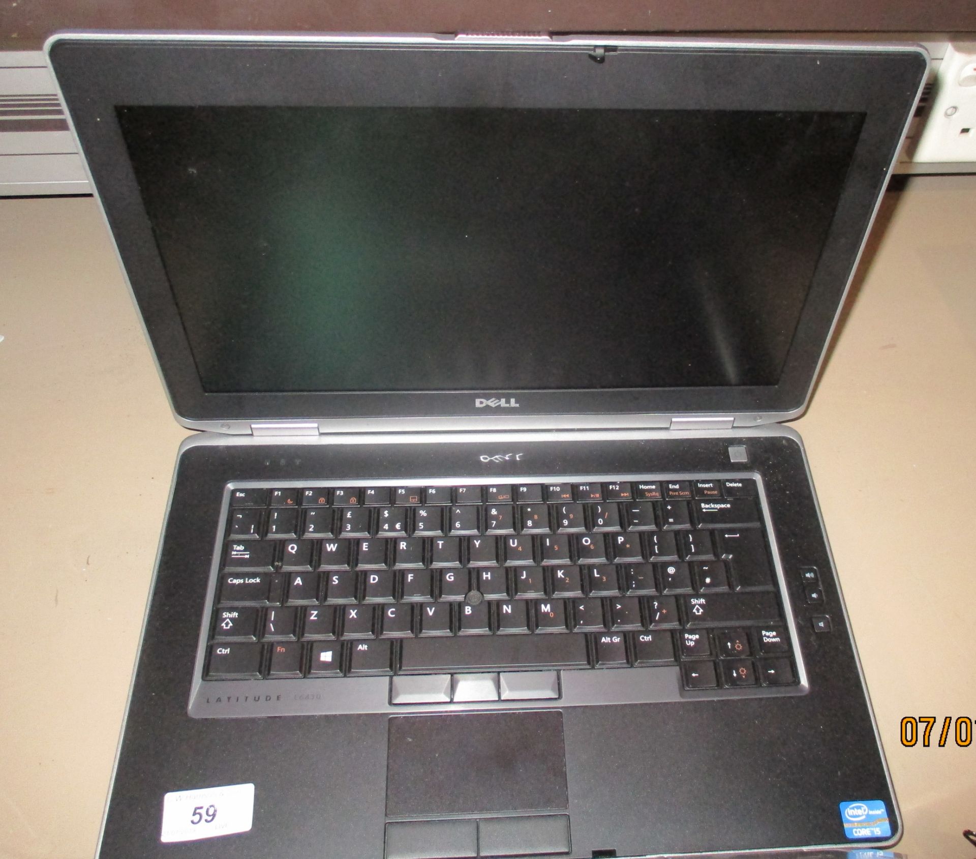 A Dell Latitude E6430 laptop computer - no power lead