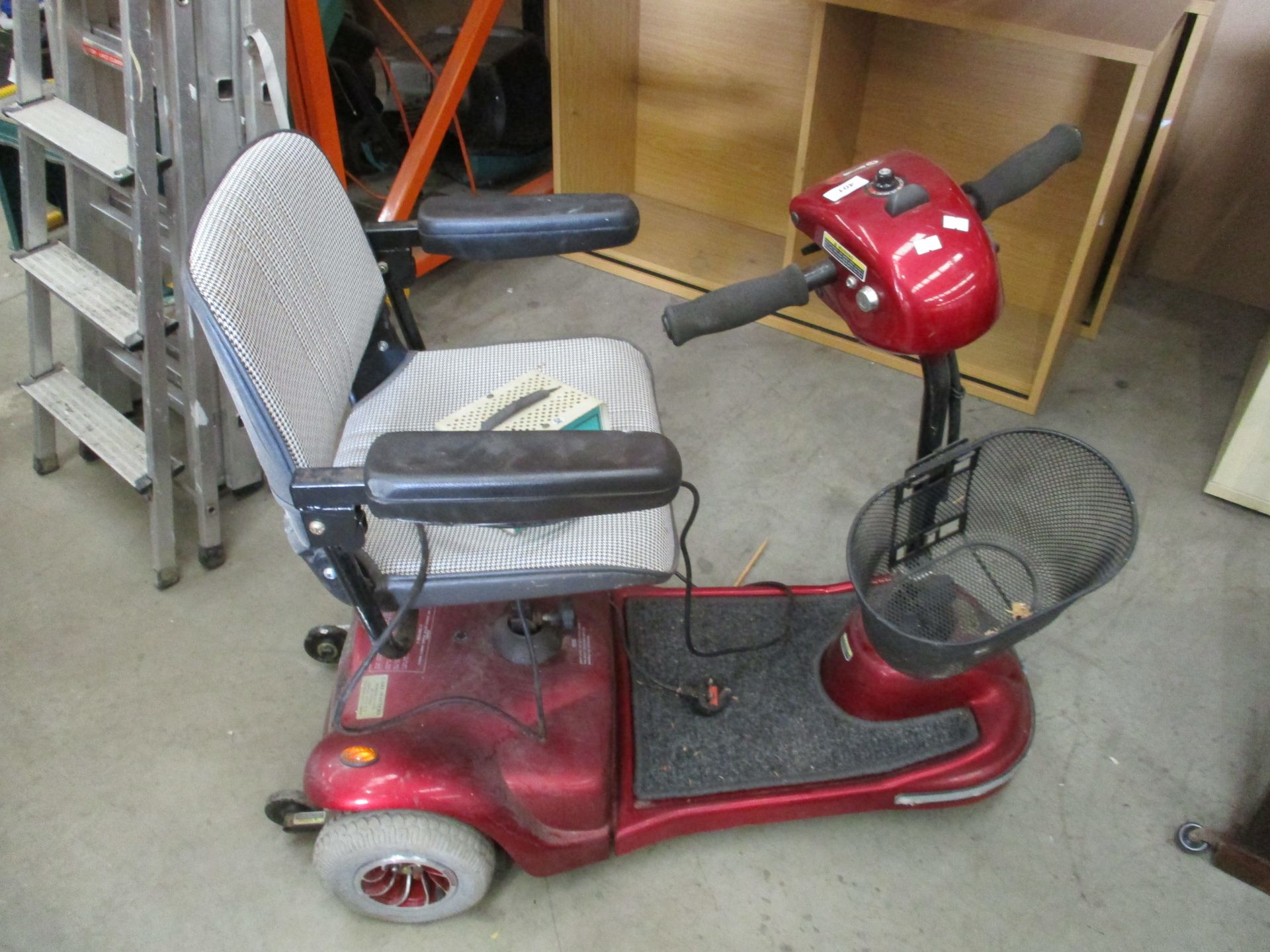 Shoprider Deluxe 3 wheel mobility scooter in red complete with keys and battery charger by Phisiang