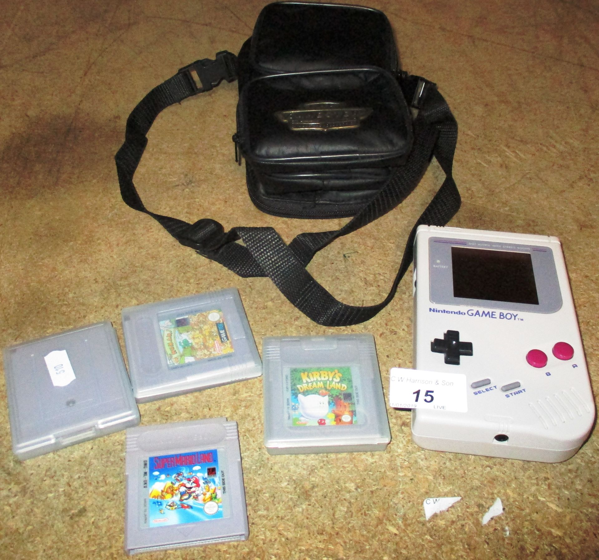 A battery operated Nintendo Gameboy hand held console complete with 4 games - Tetris, The Humans,