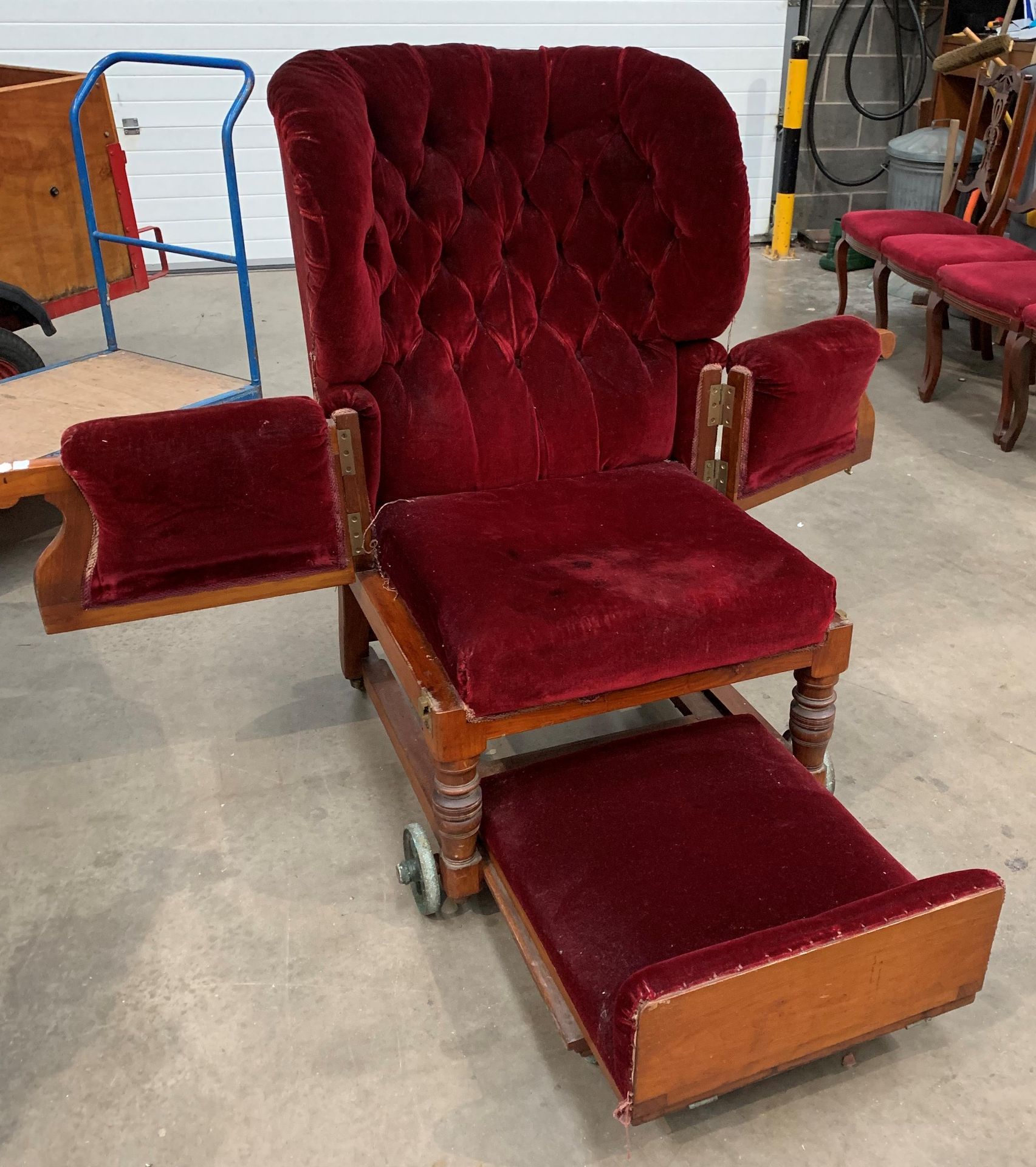 A Victorian invalid chair recovered in red velvet raised on brass wheels and labelled Leveson and - Image 3 of 6