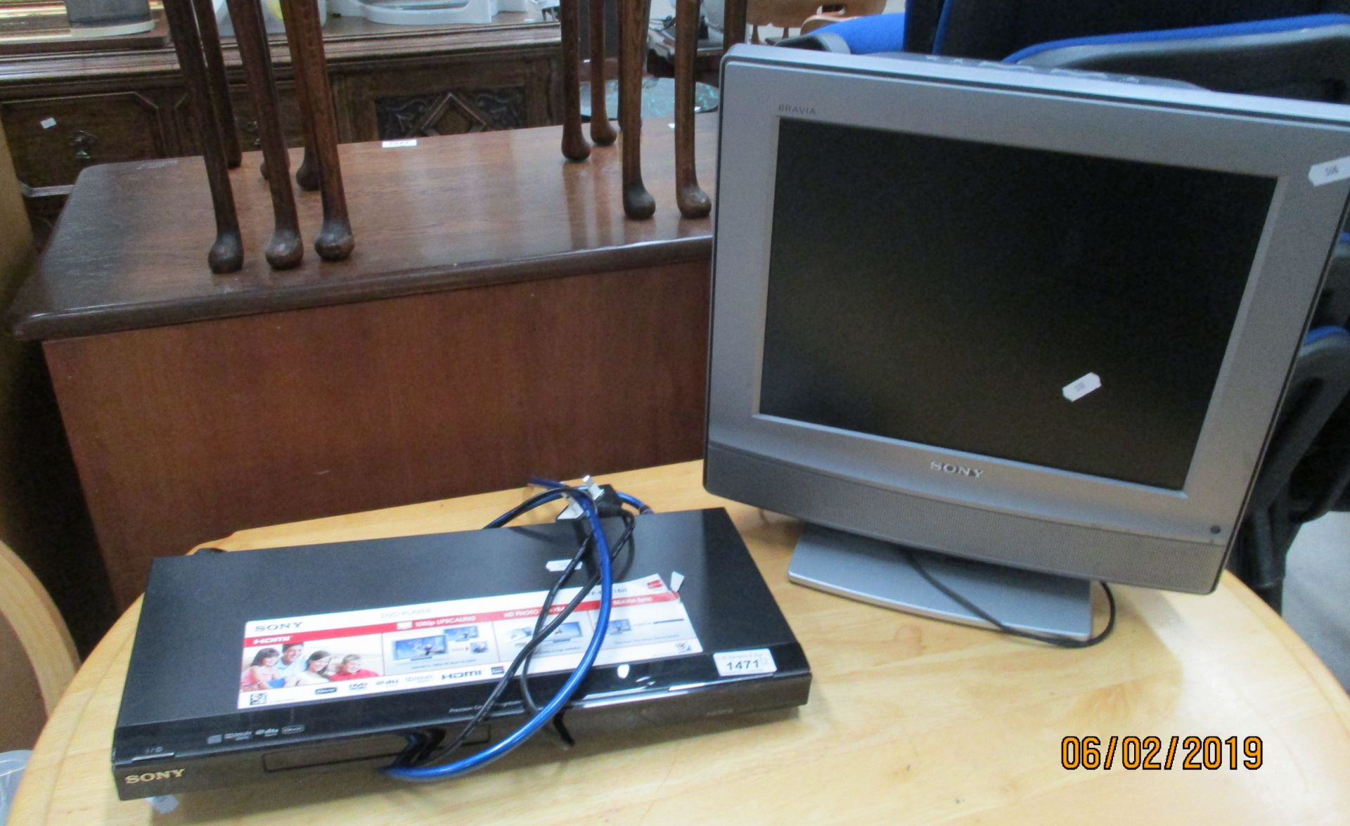 2 items - a Sony DVP-N5718H DVD player and a Sony KDL-15G 2000 LCD colour TV complete with adaptor