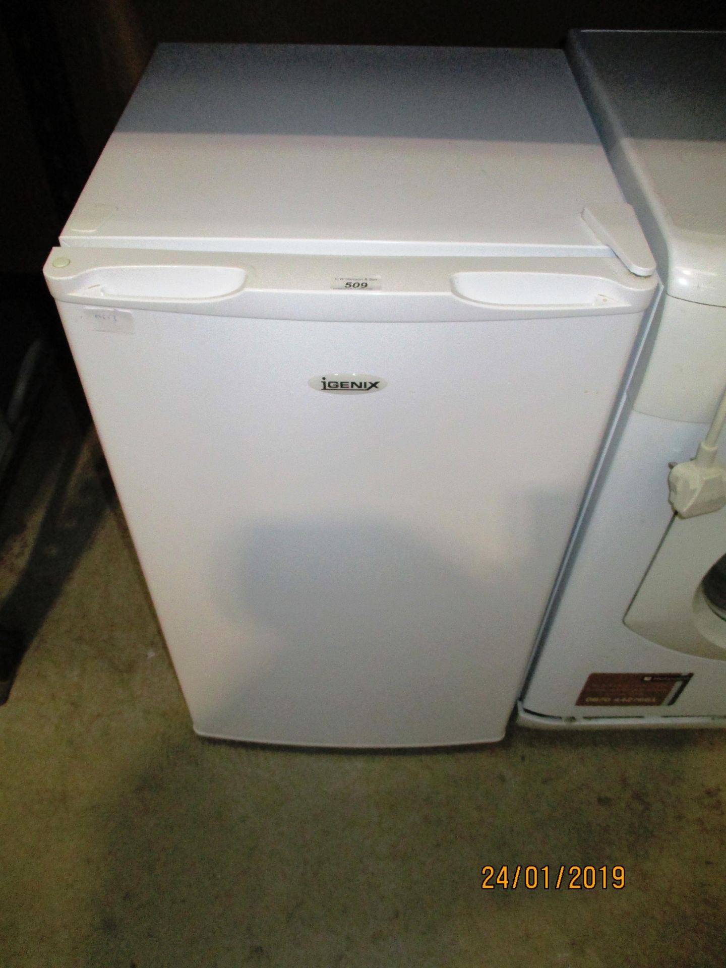 An white Igenix under counter refrigerator