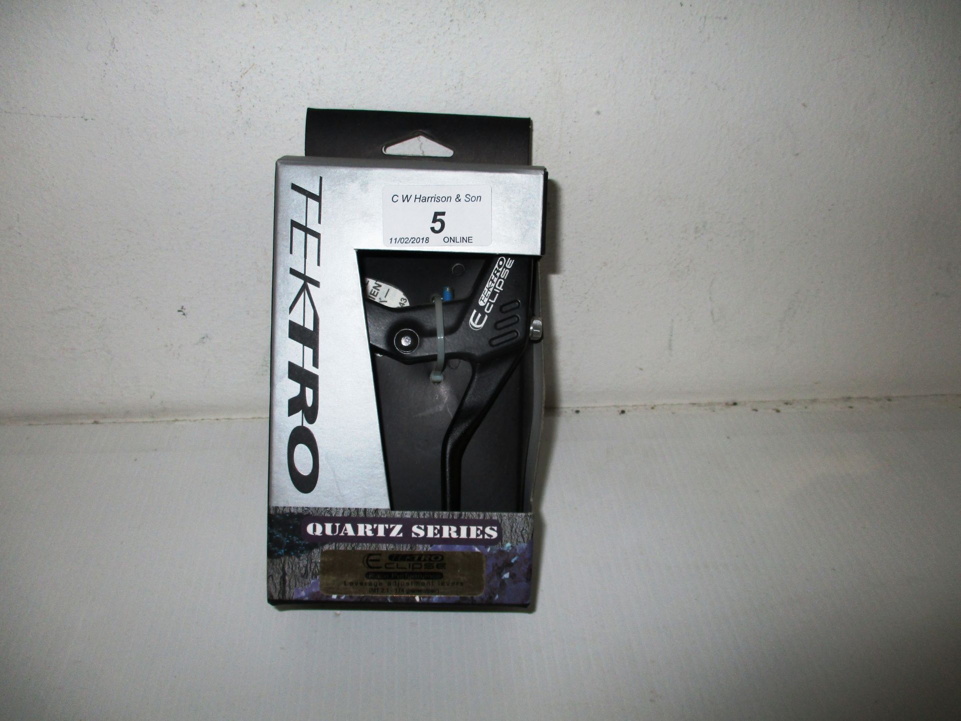 A Tektro Quartz Series Eclipse race performance leverage adjustment levers