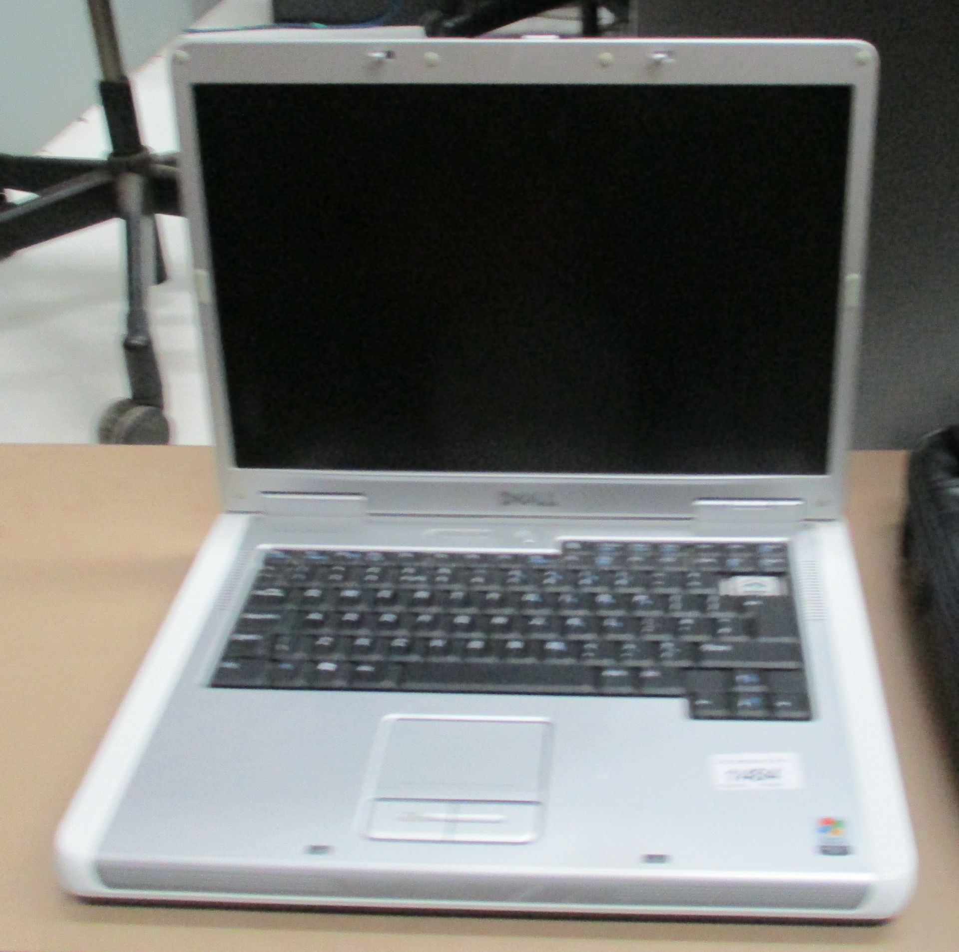 A Dell Inspiron 1501 laptop computer - no power lead