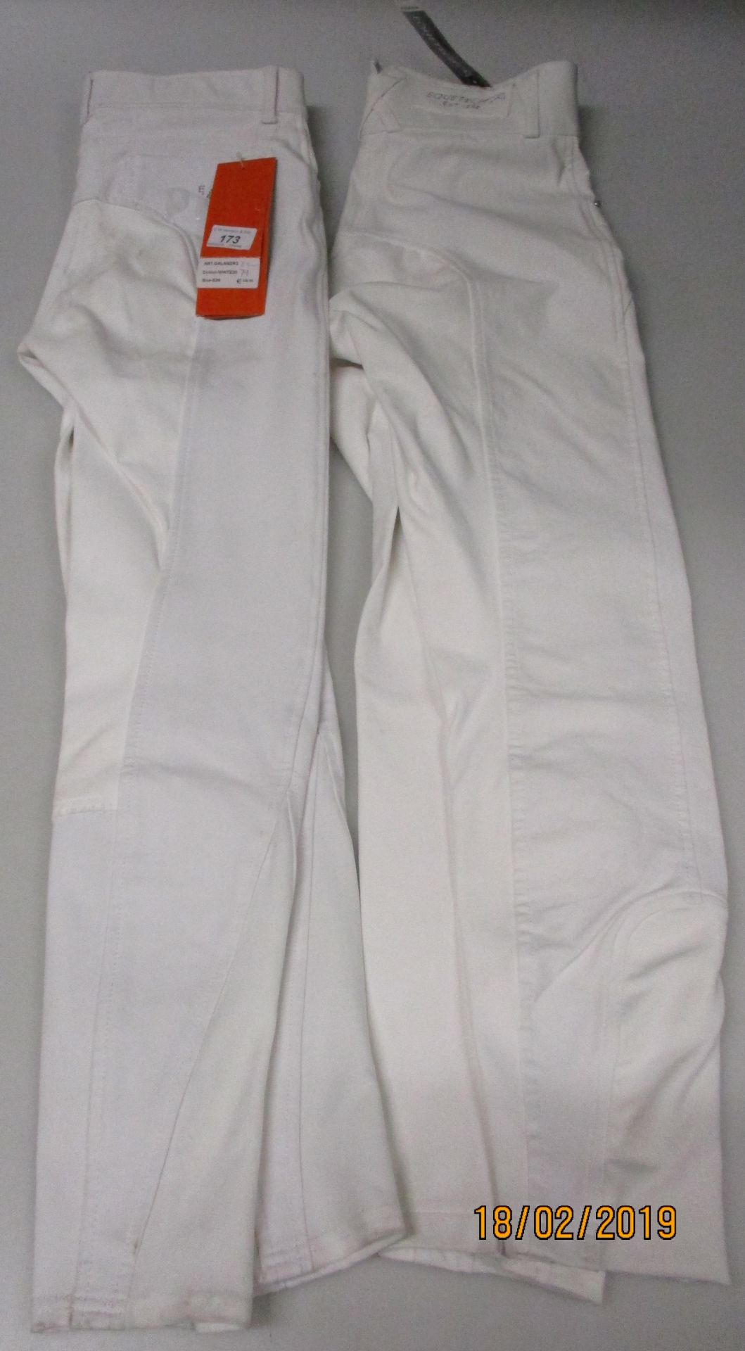 2 assorted pairs of white jodhpurs by Equetech size 24 and PK2 size 36