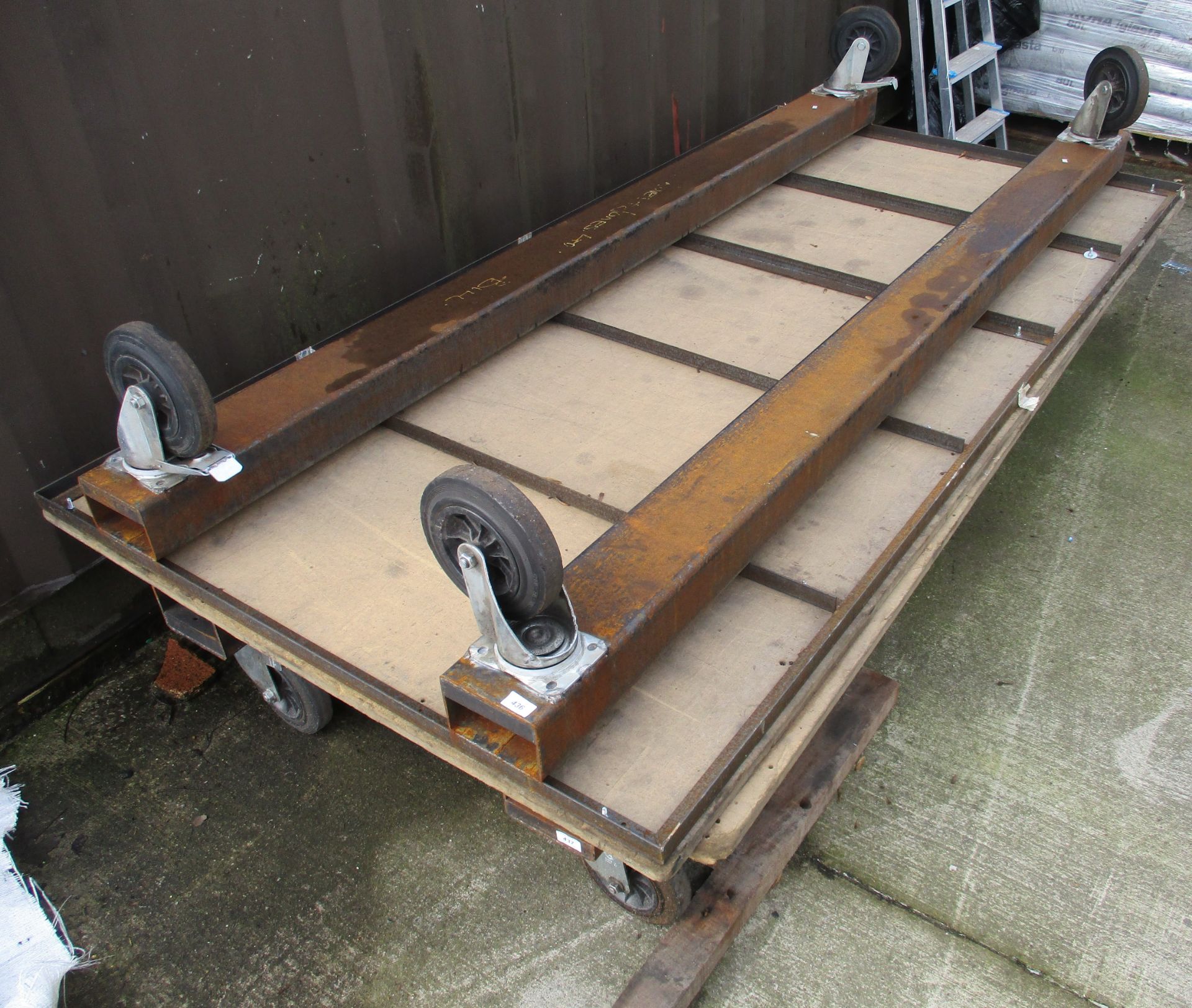 A large industrial flatbed four wheel bogey 120 x 240 cm