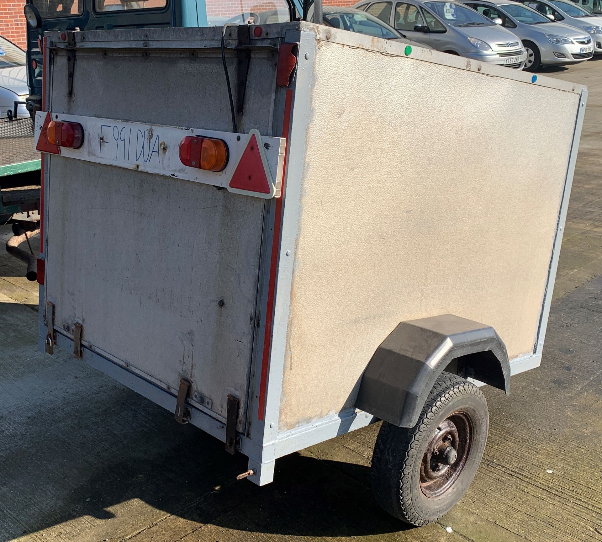 A metal framed single axle box trailer 120 x 54 x 110 cm high complete with spare wheel and key for - Image 3 of 3