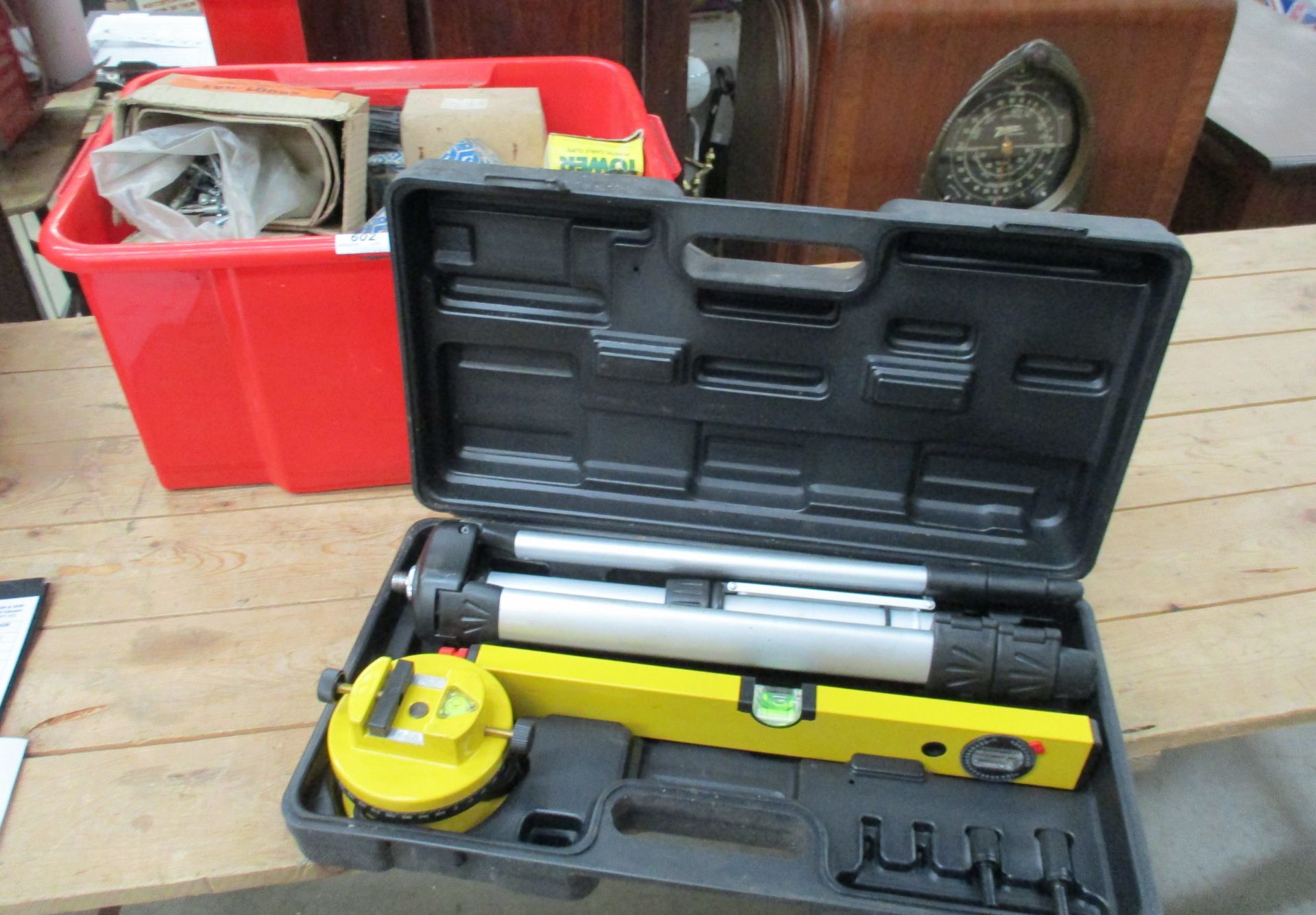 A Lasertool level tool kit - incomplete, and a box of wood screws,