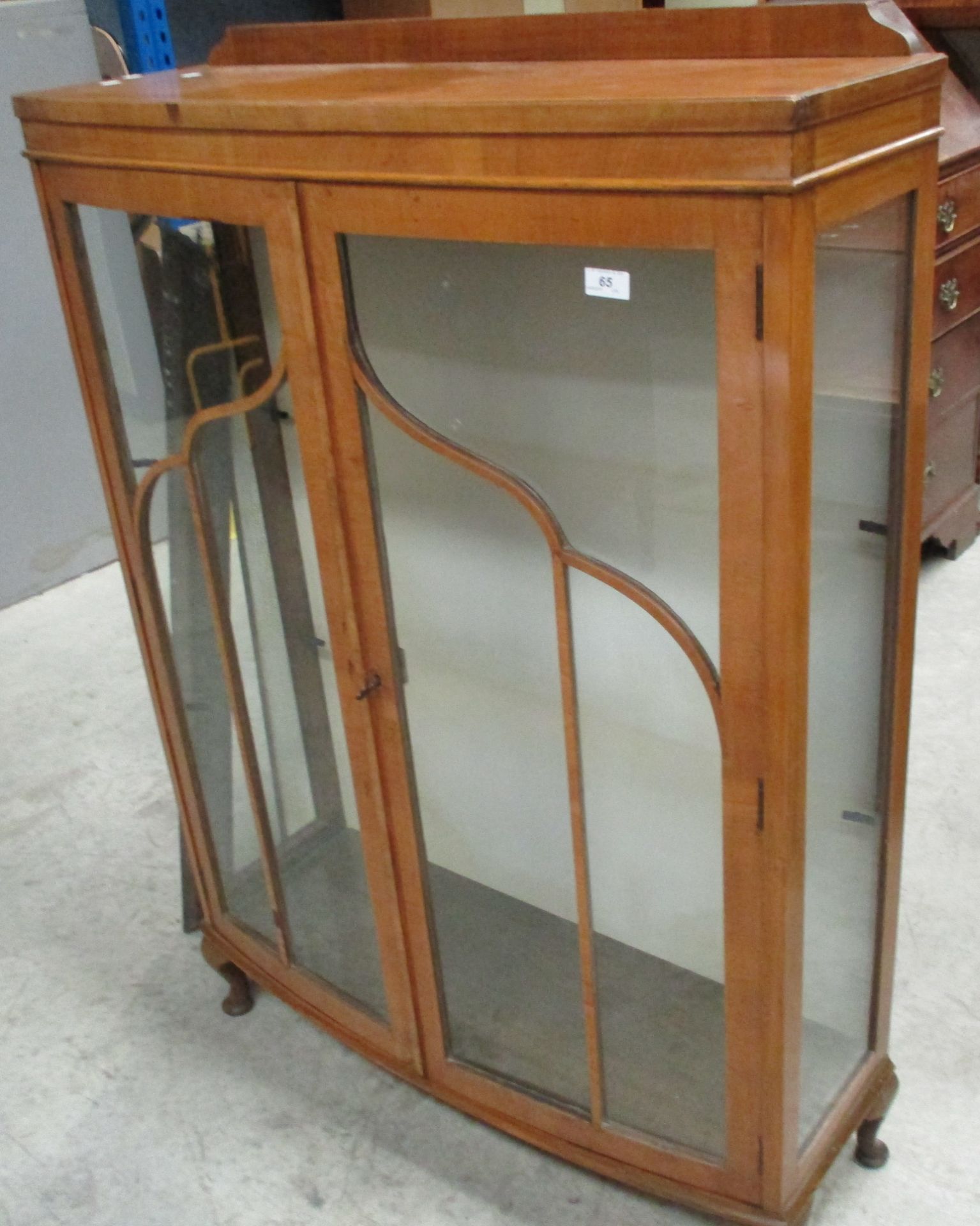 A walnut bow front display cabinet 90cm