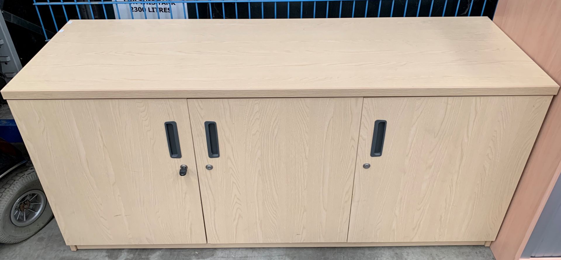 A maple finish 3 door office sideboard 160cm