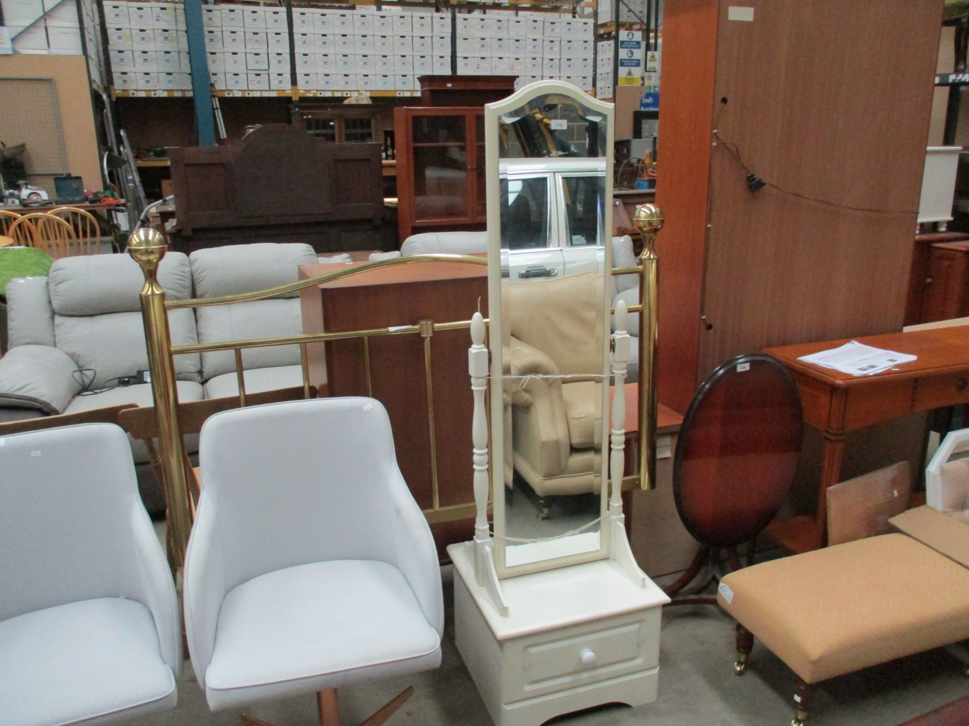 Brass 3'6" headboard and a cream framed cheval mirror mounted on a single drawer base (2)