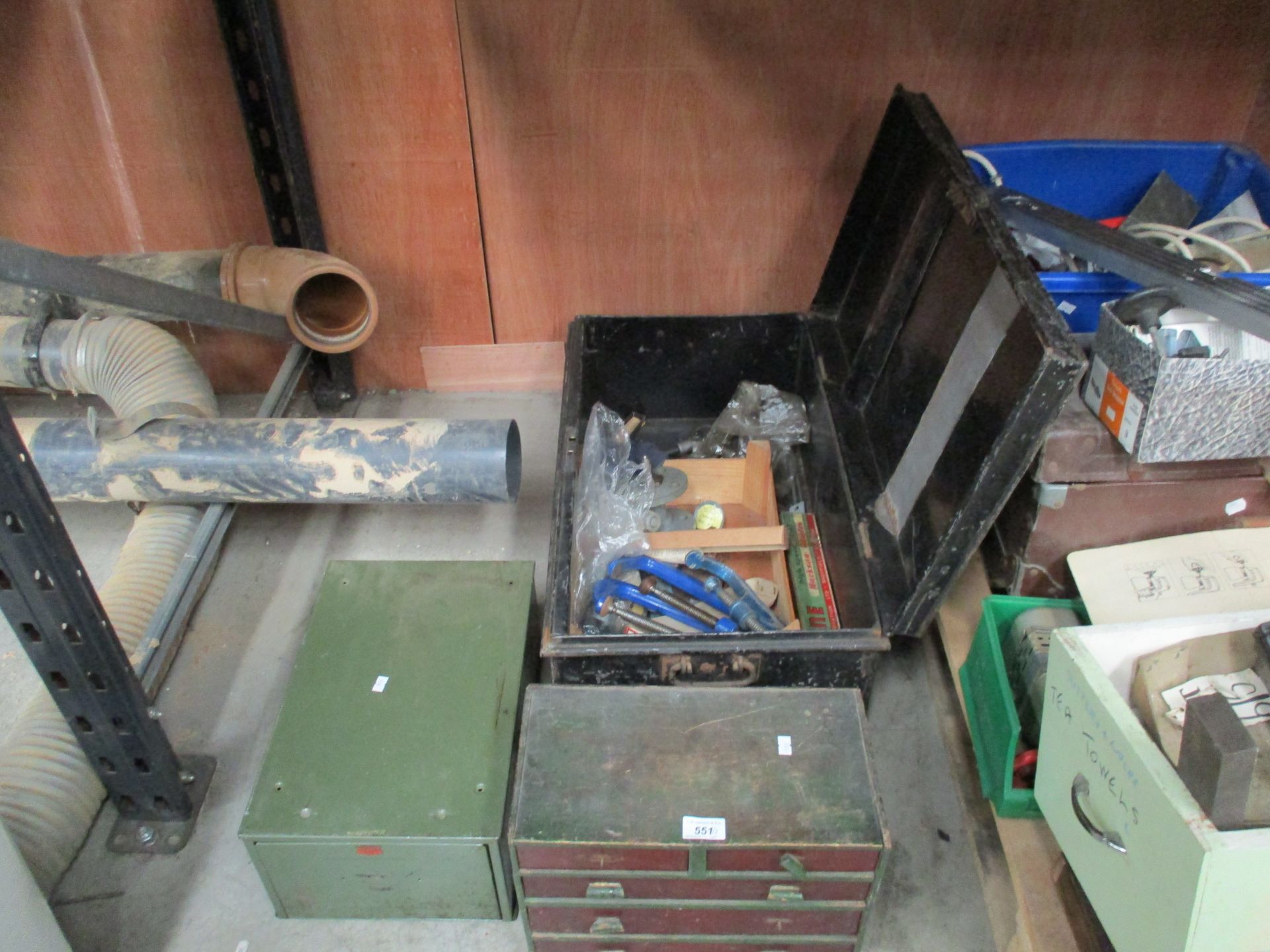 Green metal index cabinet, wooden filing drawers and black metal trunk and any contents,