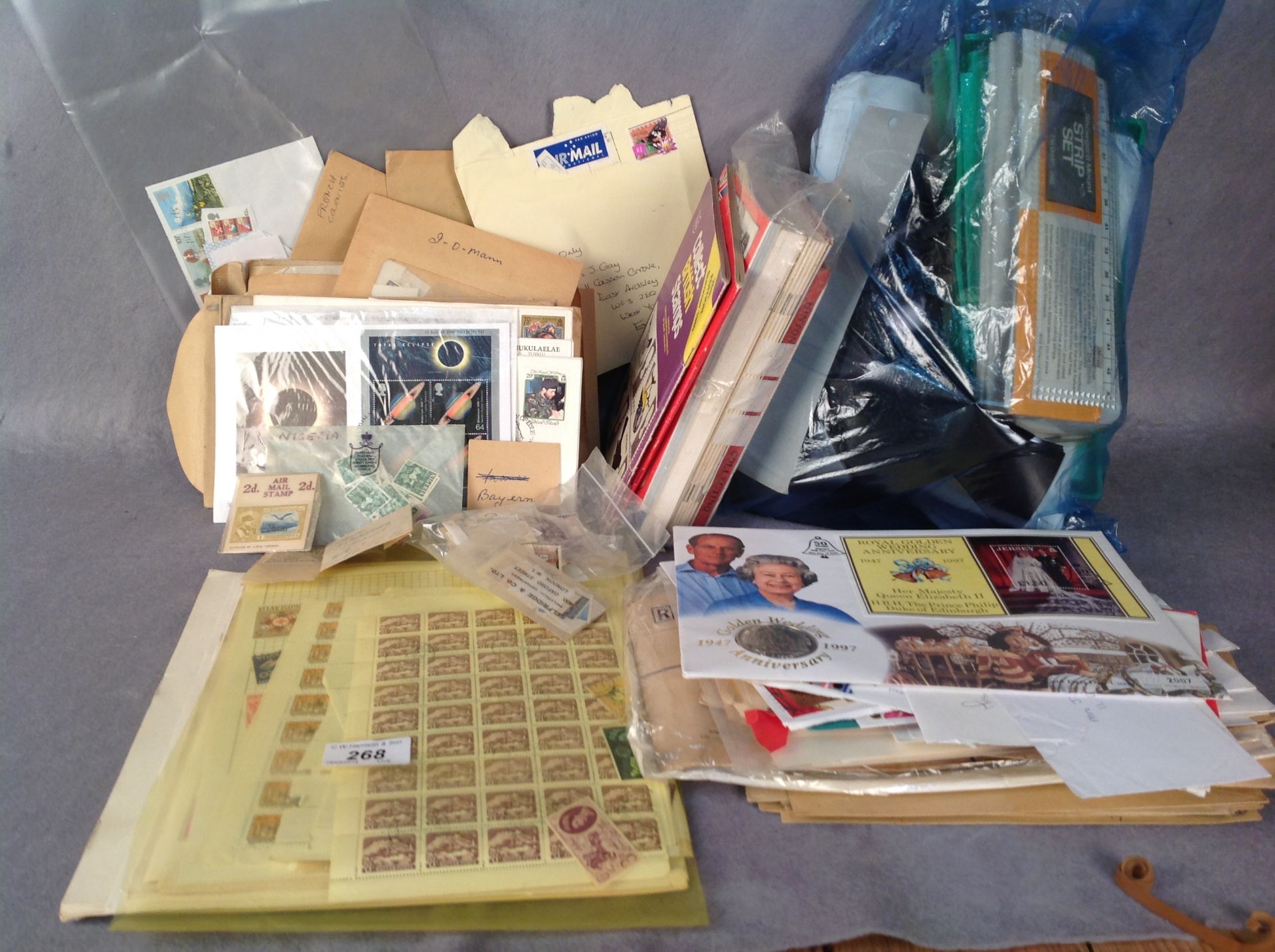 Contents to box, loose European and world stamps,