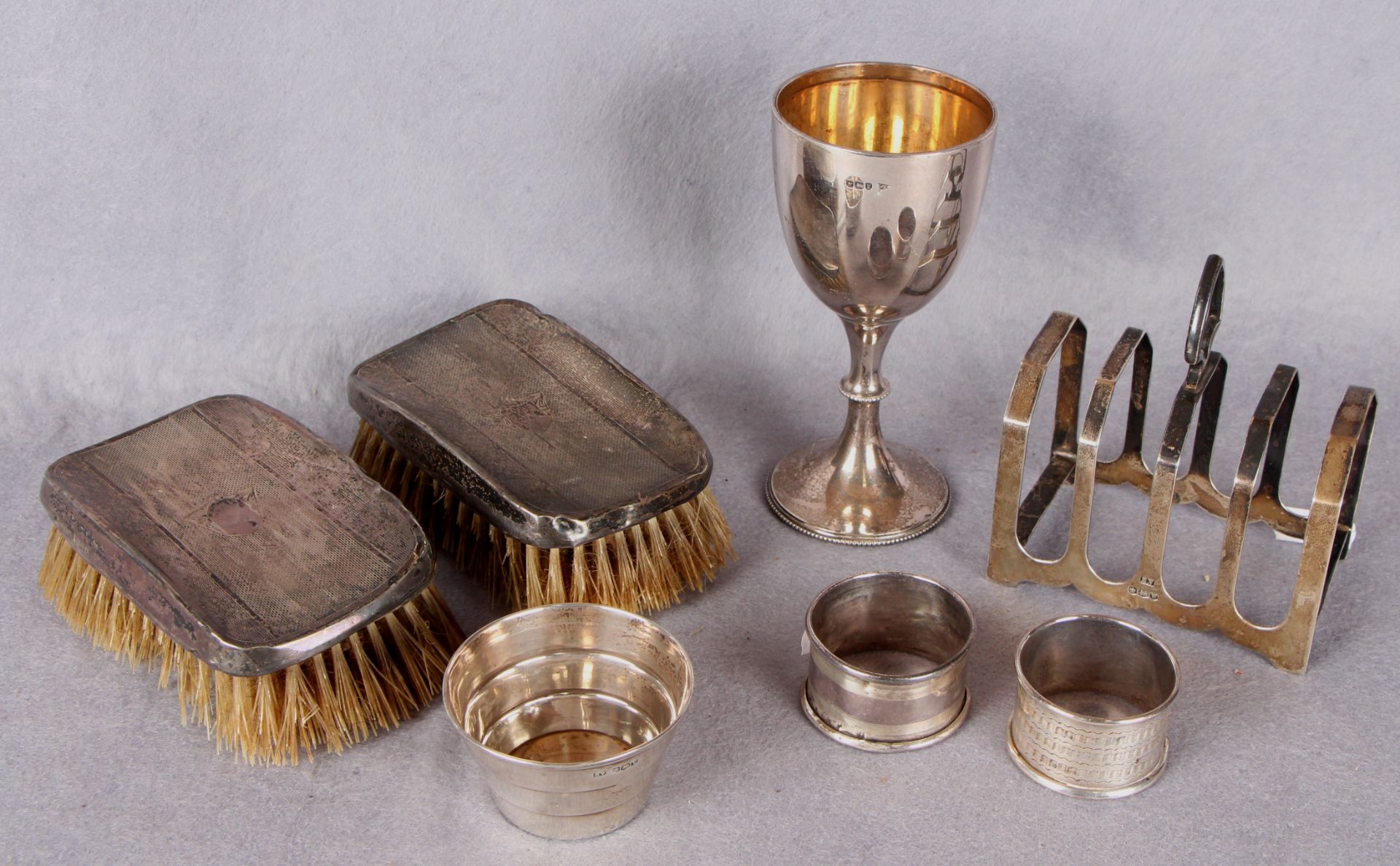 Silverwares comprising semi-ovoid wine goblet, Sheffield 1896, four division toast rack,