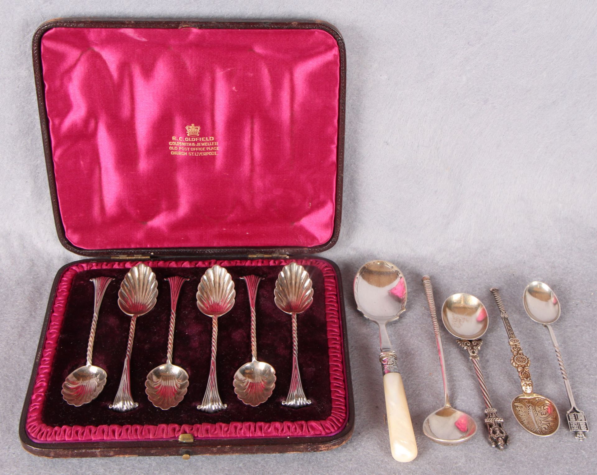 A Victorian set of six silver teaspoons with shell bowls, twist stems and scroll terminals,