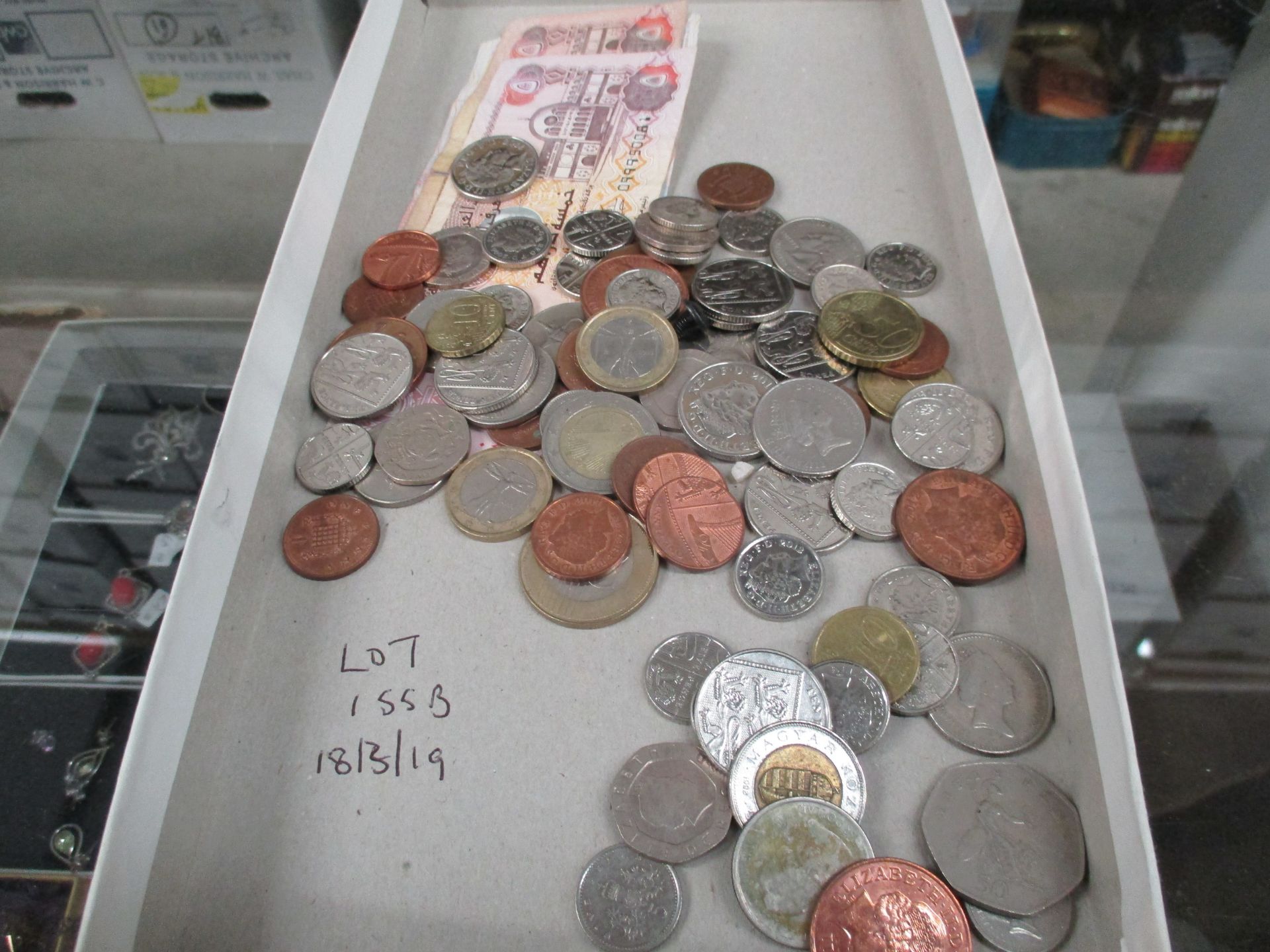 Contents to lid - Small quantity of World Note and coins including some Euros - please note this