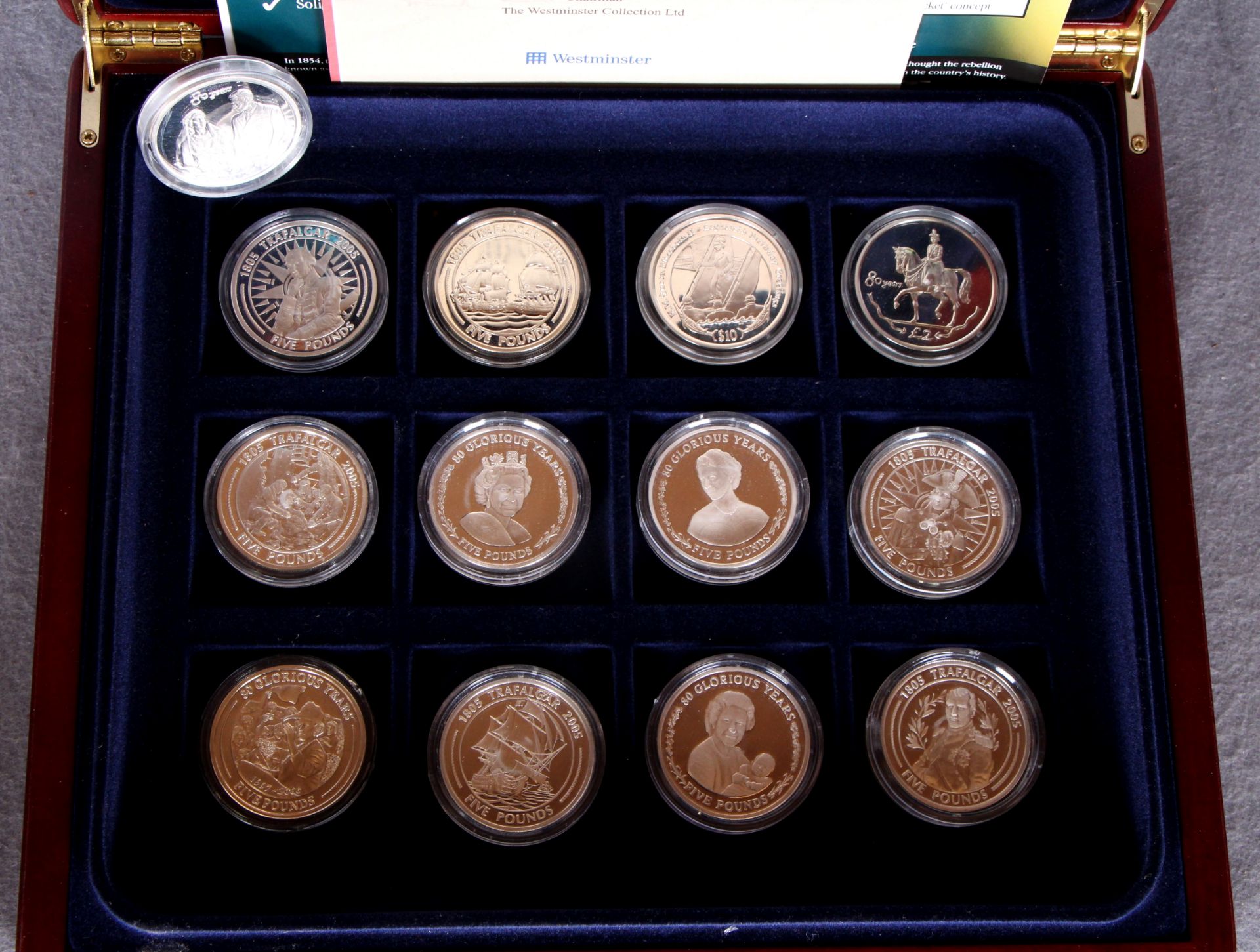 13 Queen Elizabeth III commemorative silver crowns (mainly £5) in a commemorative box - Image 2 of 2