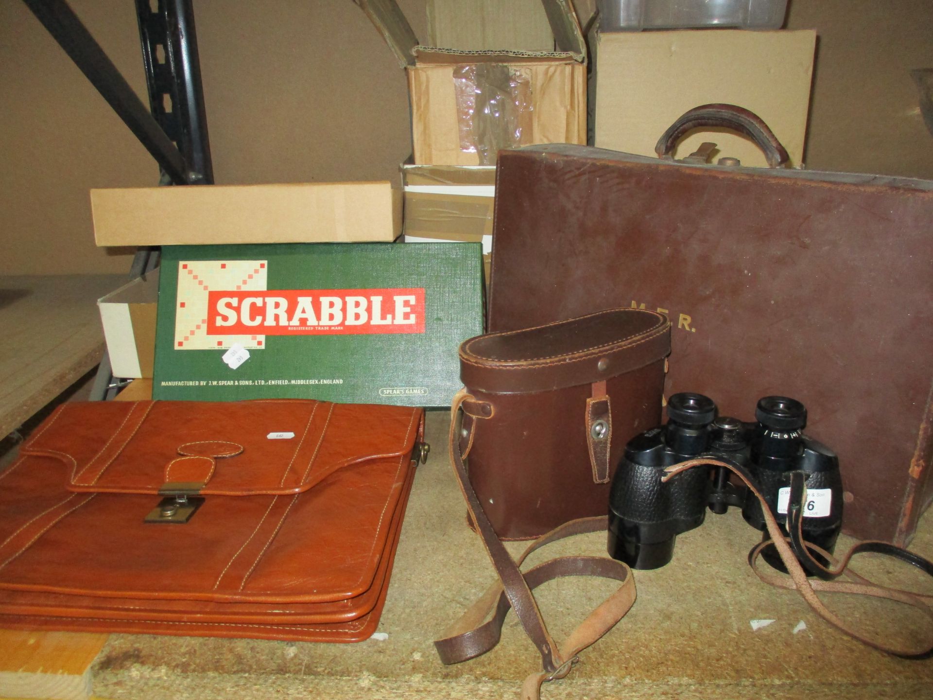 A Hide Out brown leather briefcase/satchel (no strap), pair of Ross 9X35 binoculars,