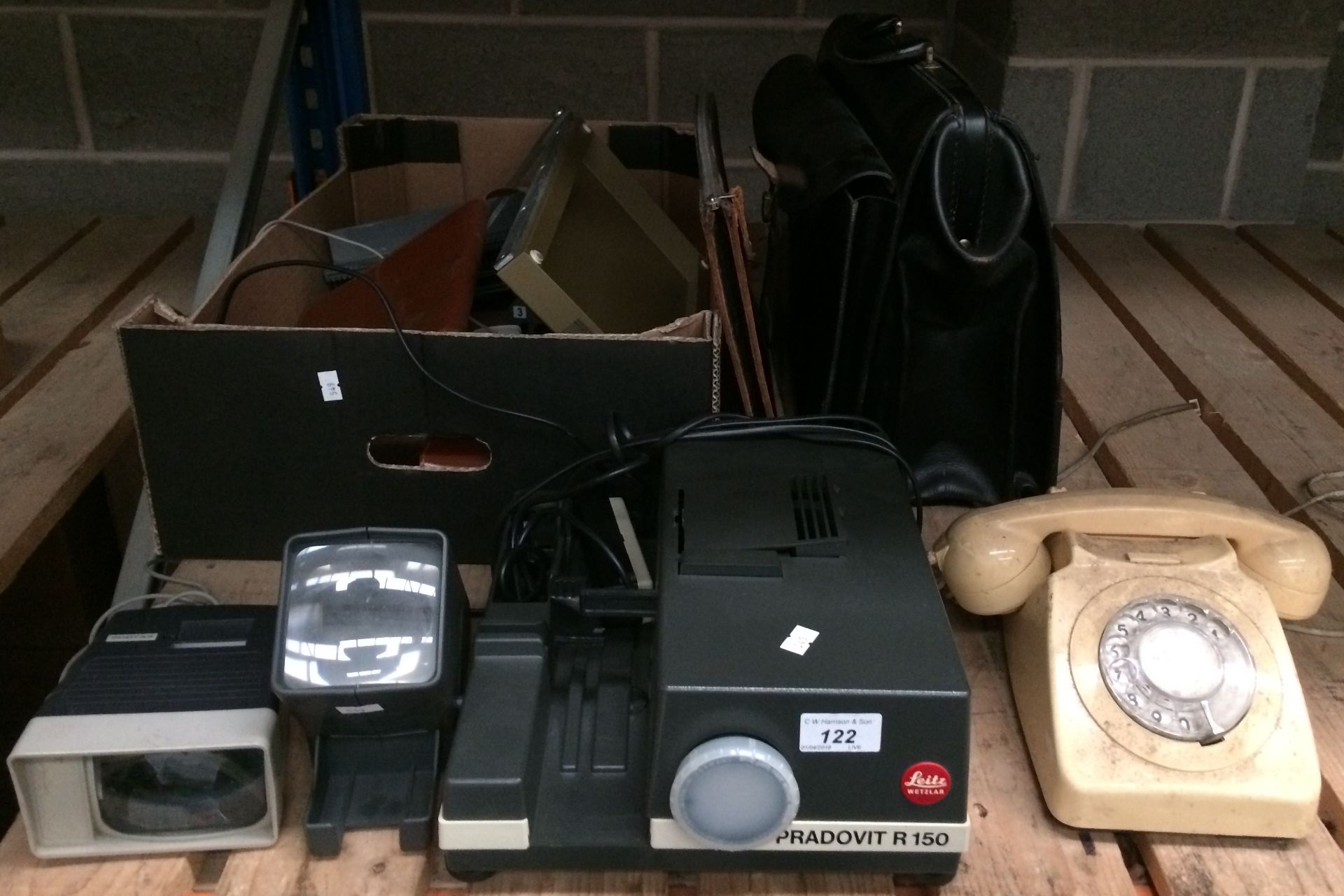 A Pradovit R150 slide projector (not tested), vintage telephone, leather briefcase, etc.