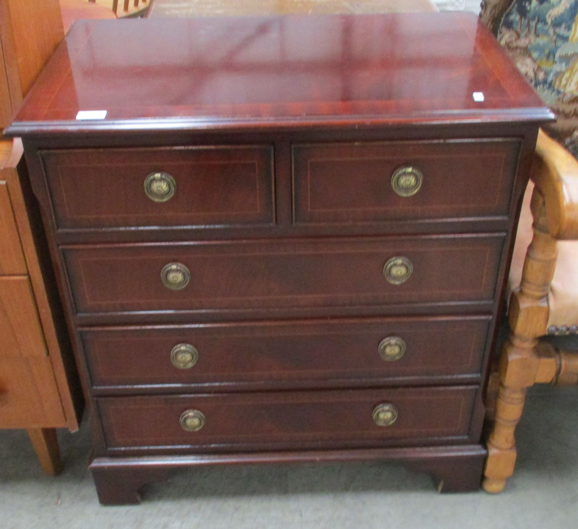 A mahogany finish 5 drawer (2 short,