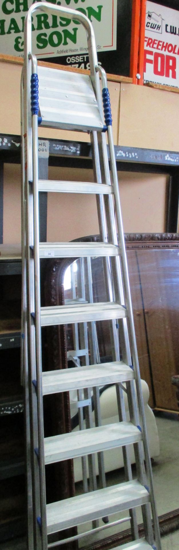 A pair of aluminium 7 step step ladders