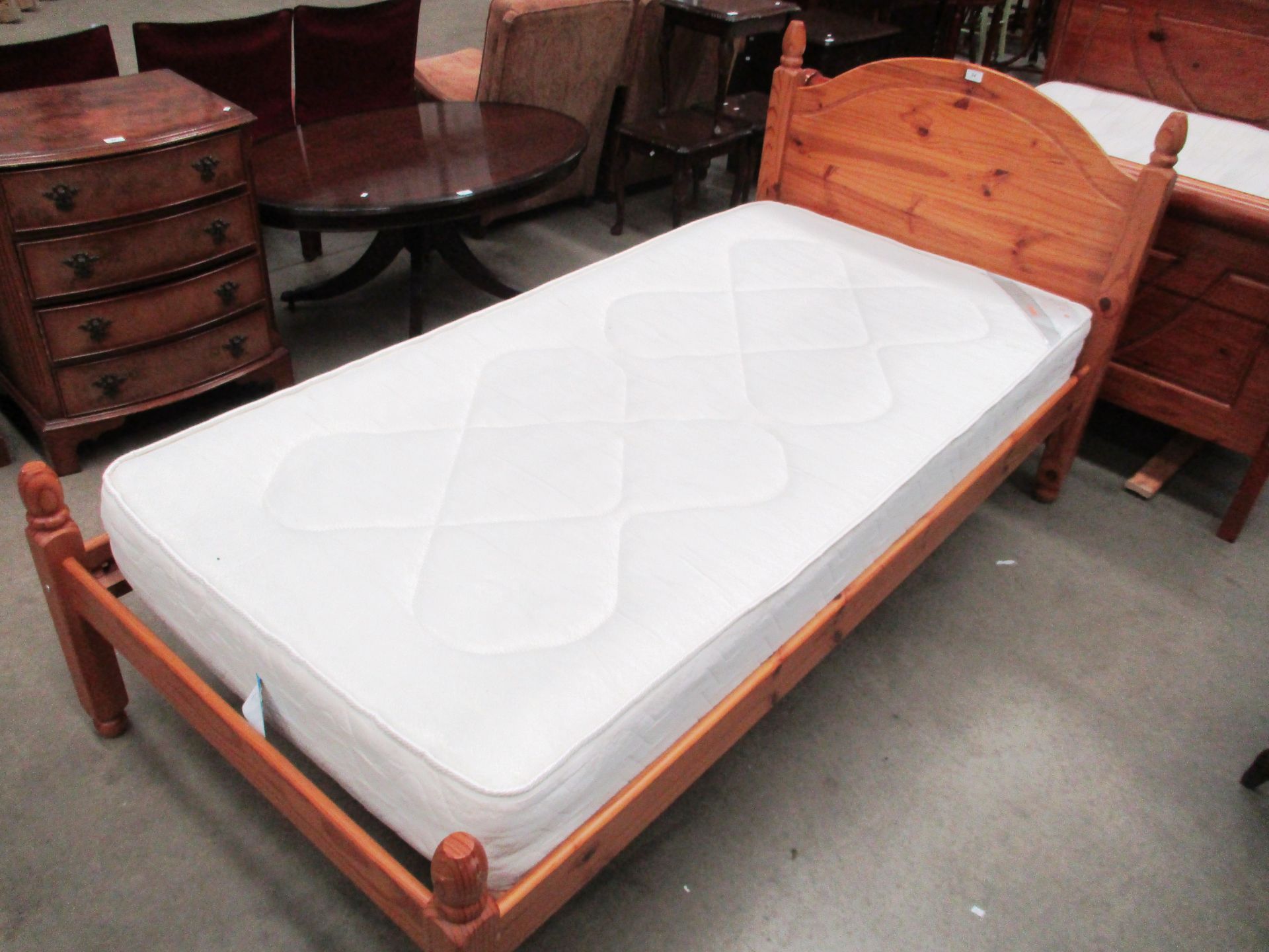 A pine 3ft bed with a Sleep Mode Lincoln hypo-allergenic rotatable mattress