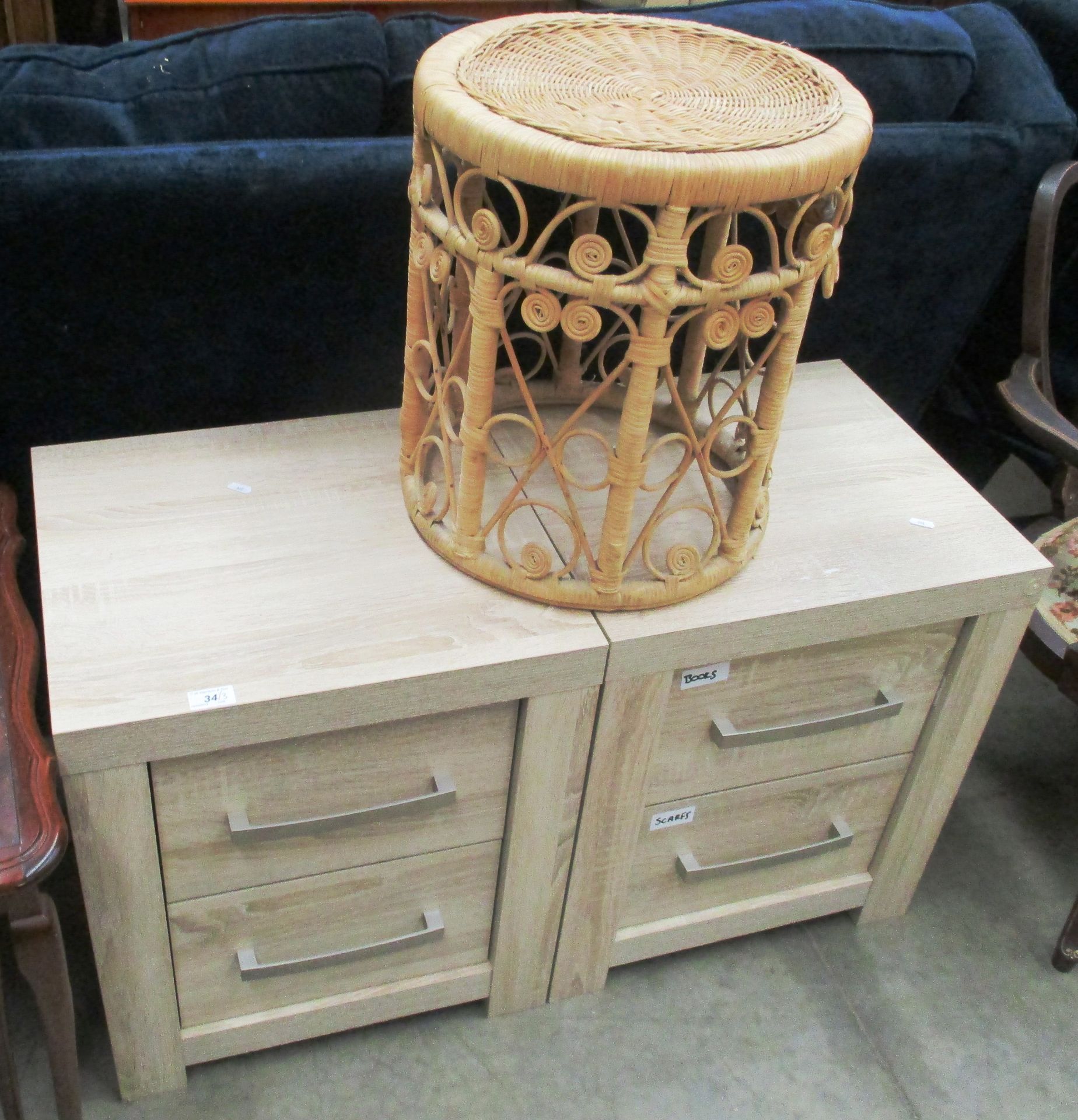 A pair of limed oak 2 drawer bedside cupboards and a woven circular stool (3)