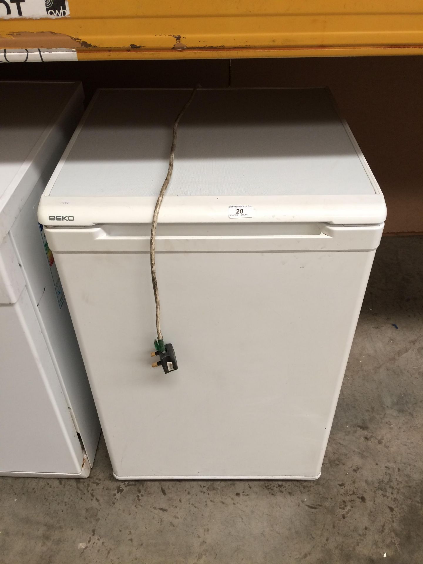 A Beko white under counter fridge - sold as seen not working