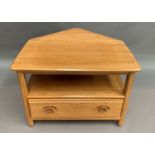 An Ercol blonde elm single drawer entertainment stand 72 x 45c,