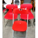 An Italian red polypropylene chrome framed armchair and matching chair each MRP £101 and a red