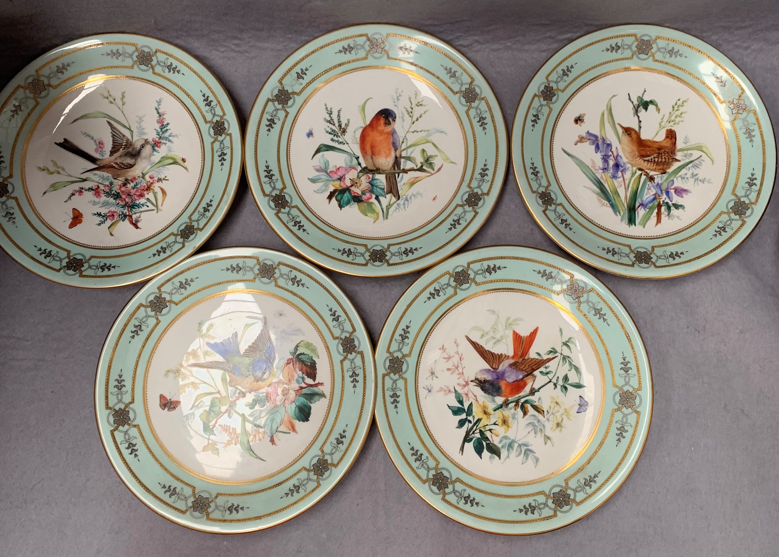 Five Royal Worcester plates depicting birds, light green borders with gilt decoration, - Image 2 of 18