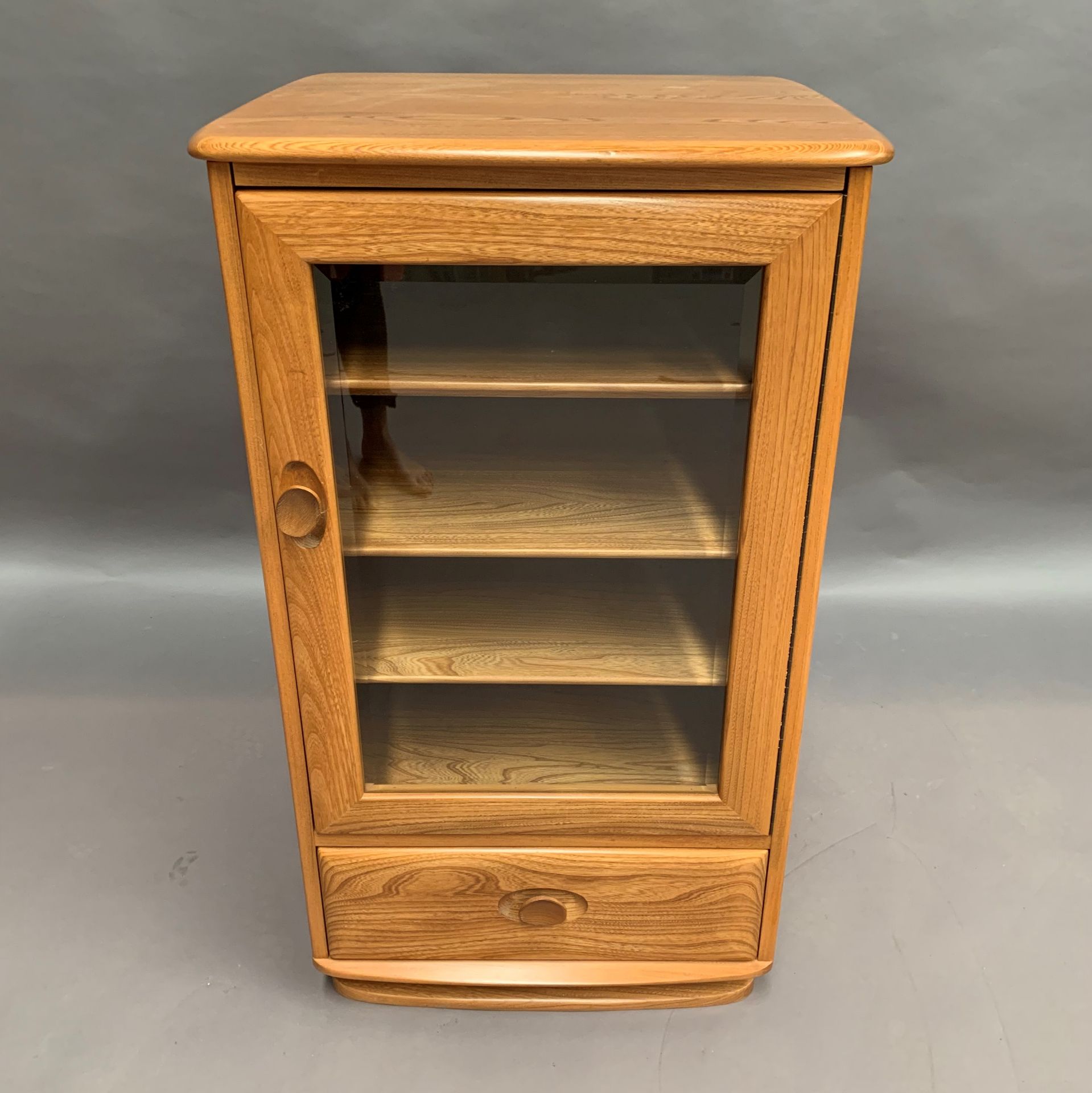 An Ercol blonde elm mobile stereo cabinet with glass door and single drawer with lift top 56 x 48 x - Image 3 of 3