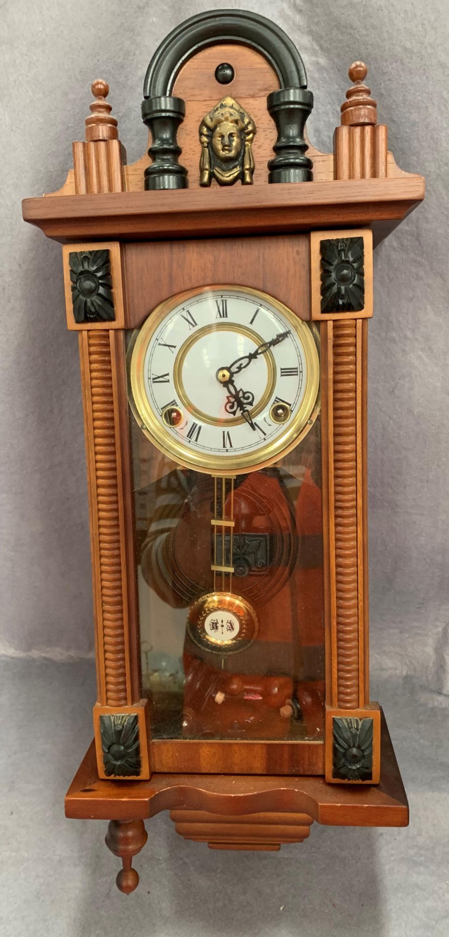 A small modern Viennese style wall clock - 56cm