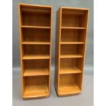 A pair of Ercol blonde elm five shelf open front bookcases/display cabinets,