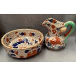 An ironstone china jug and a bowl, jug 23cm high,