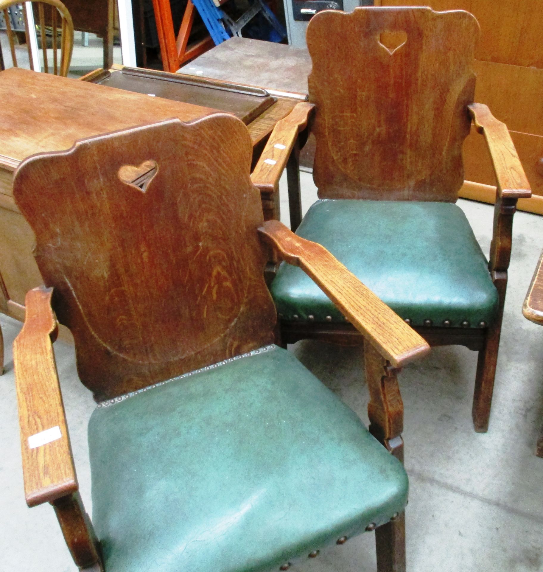 Pair of oak open elbow chairs