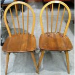 A pair of Ercol elm dining chairs