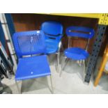 An Italian stacking armchair in blue polypropylene on chrome frame MRP £85 a non matching blue