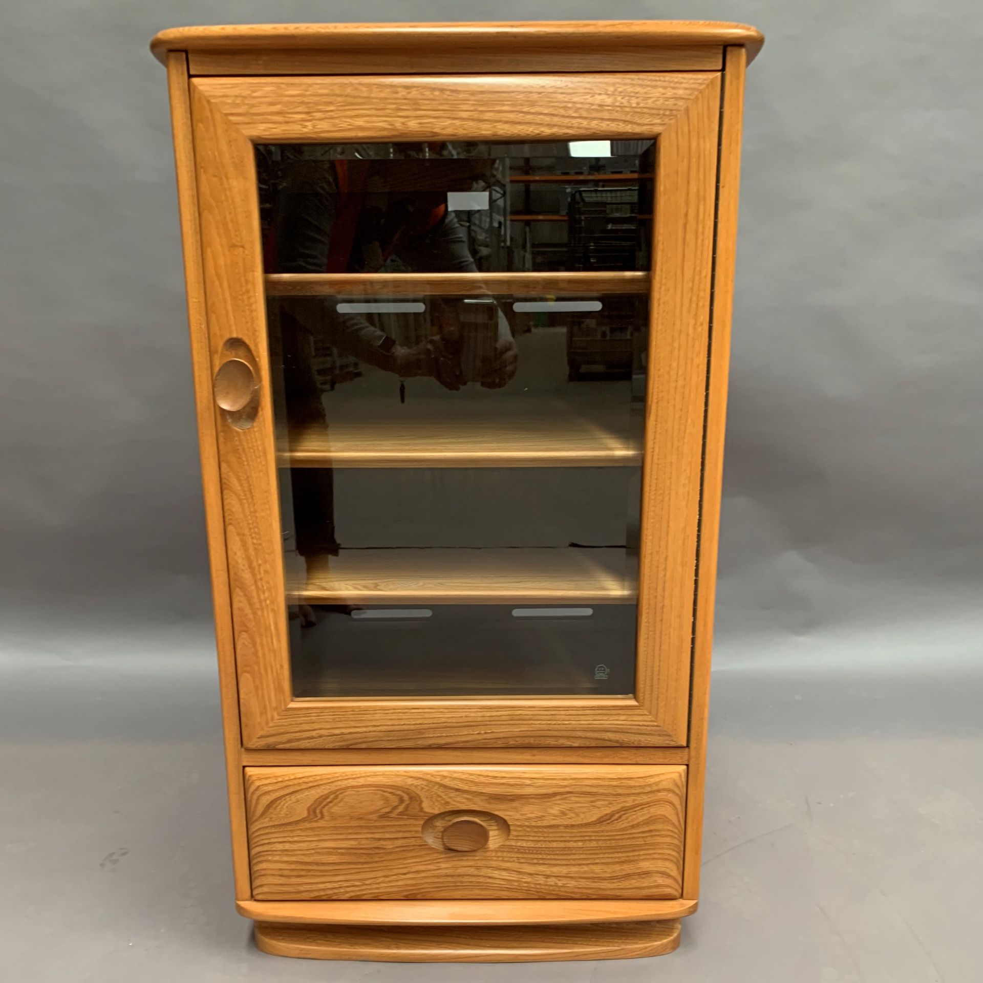 An Ercol blonde elm mobile stereo cabinet with glass door and single drawer with lift top 56 x 48 x - Image 2 of 3