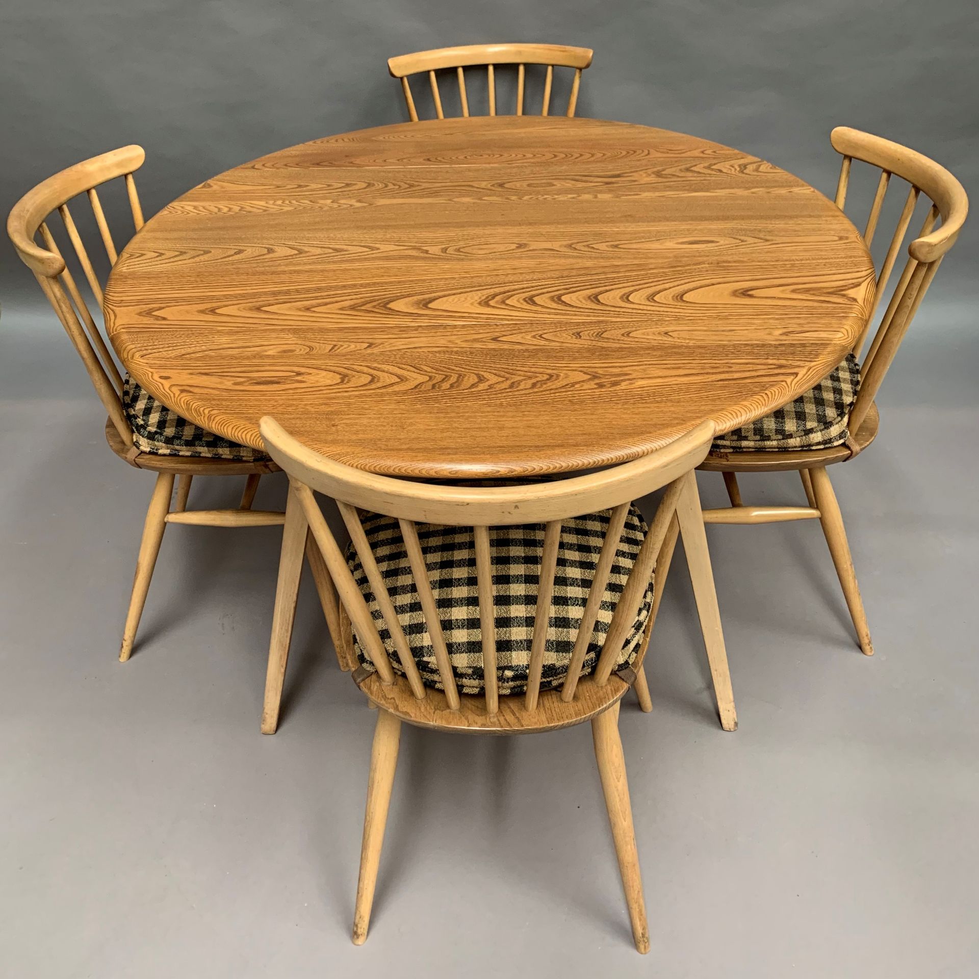 An Ercol blonde elm drop leaf dining table 113 x 125cm extended together with four Ercol stick back - Image 2 of 3