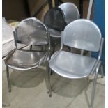 Four Italian steel chairs in black,