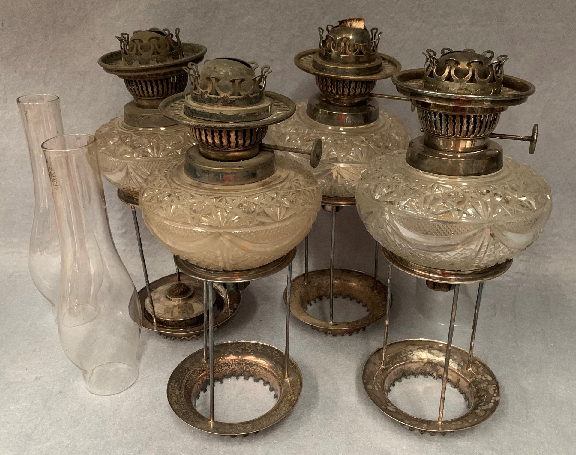 Four glass and silver plated candle holders with mounts and three funnels labelled Hinks and Son - Image 2 of 2